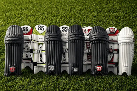 Top 5 SS batting pads in 2026 for junior and professional cricketers displayed on a grass cricket field