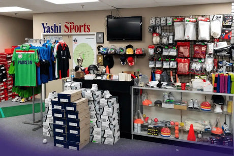 Interior view of Yashi Sports cricket store showcasing a wide range of cricket equipment, including bats, gloves, and pads for club cricketers